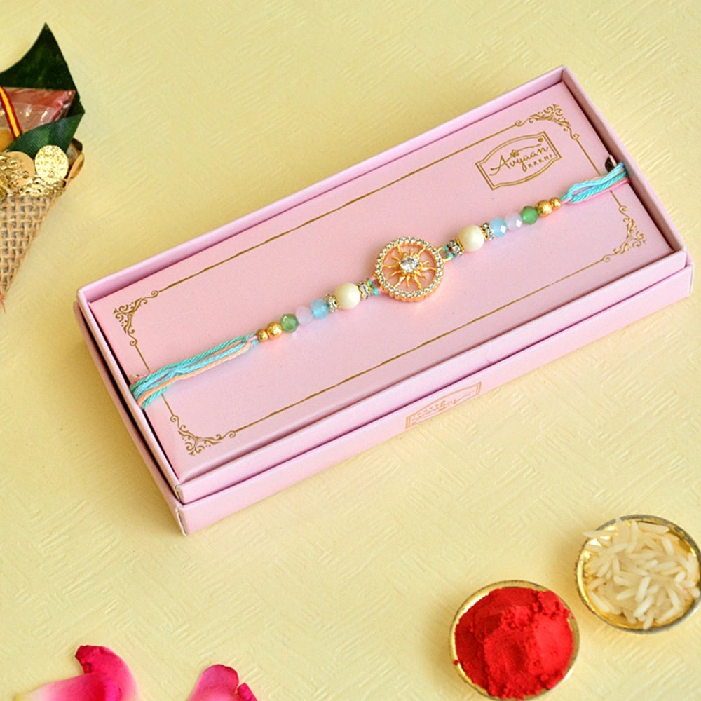 Pastel Mandala Rakhi – RK-113 | Elegant Floral Design with Soothing Beads & Multicolor Threads