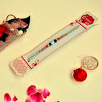 Tribal Touch Rakhi – RK-129 | Braided Blue Thread with Natural Beads & Stone Centerpiece