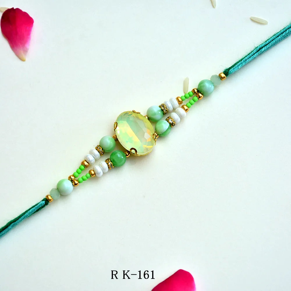 Mint Crystal Rakhi – RK-161 | Elegant Rakhi with Green Beads & Faceted Gemstone Center for Brother