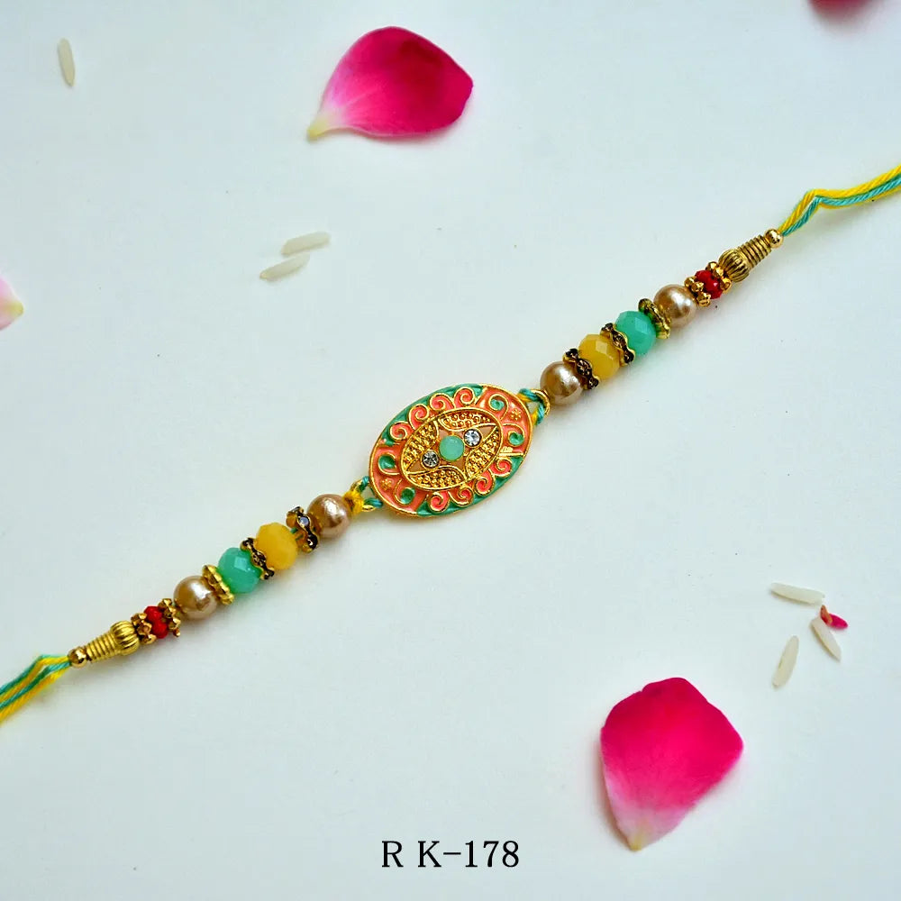 Divine Om Rakhi with Antique Finish & Beaded Elegance – RK-178