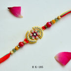 Royal Crescent Rakhi – RK-185 | Designer Half-Moon Rakhi with Stone Embellishments & Beaded Threads for Brother