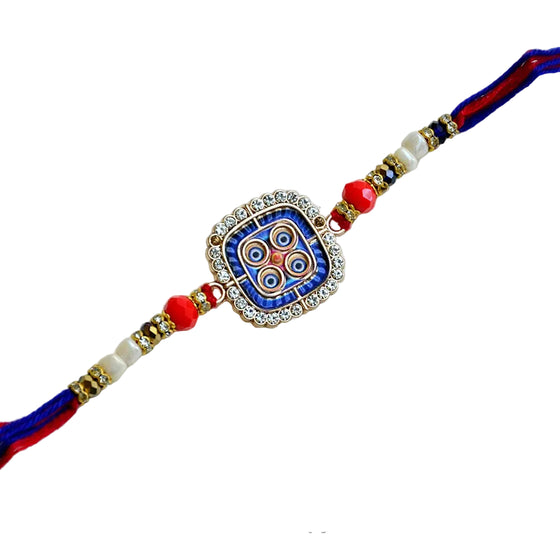 Mystic Mandala Rakhi – RK-188 | Designer Rakhi with Intricate Blue Enamel & Crystal Accents