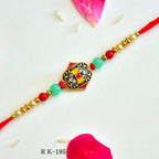 Regal Shield Rakhi – RK-195 | Elegant Rakhi with Royal Enamel Design & Sparkling Crystal Accents