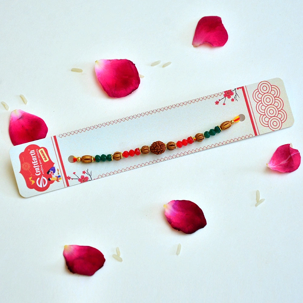 Divine Rudraksha Rakhi with Red-Green Crystal Beads - RK-299 | Sacred Elegance for Raksha Bandhan