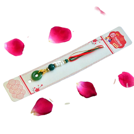 Jade-Inspired Lumba Rakhi - RK-290 | Elegant Green Thread Rakhi with Pearls & Gold Accents