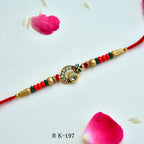 Peacock Elegance Rakhi – RK-197 | Peacock Feather Motif & Crystal Embellishments