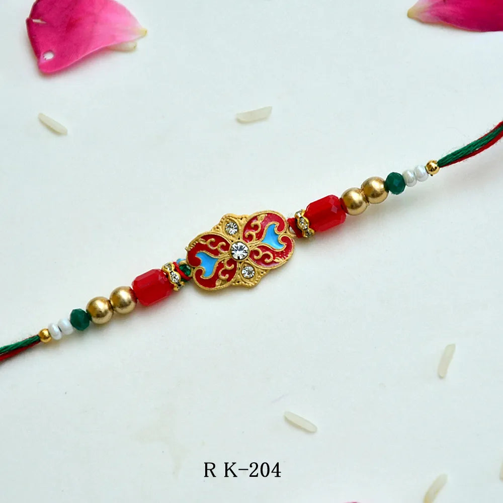 Traditional Meenakari Rakhi – RK-204 | Red & Blue Enamel Work Rakhi with Golden Beads
