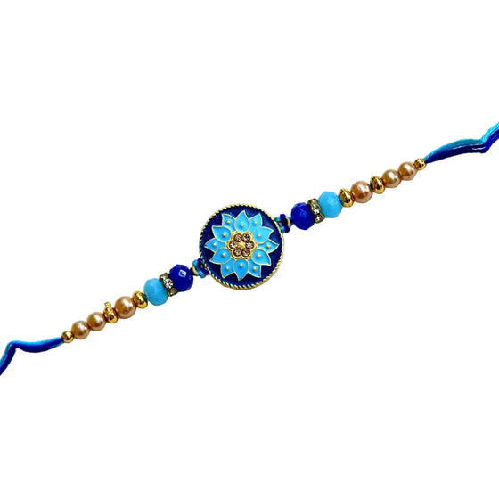 Royal Blue Lotus Mandala Rakhi – RK-206 | Meenakari Round Dial Rakhi with Crystal Accents