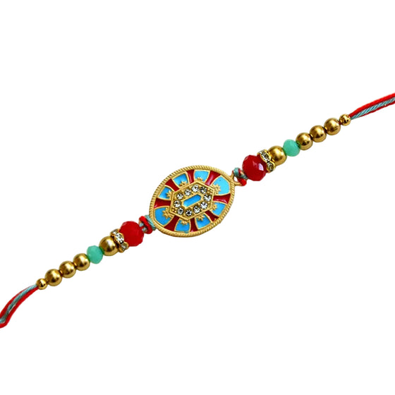 Royal Shield Rakhi – RK-208 | Elegant Rakhi with Red & Blue Enamel Centre and Golden Beads