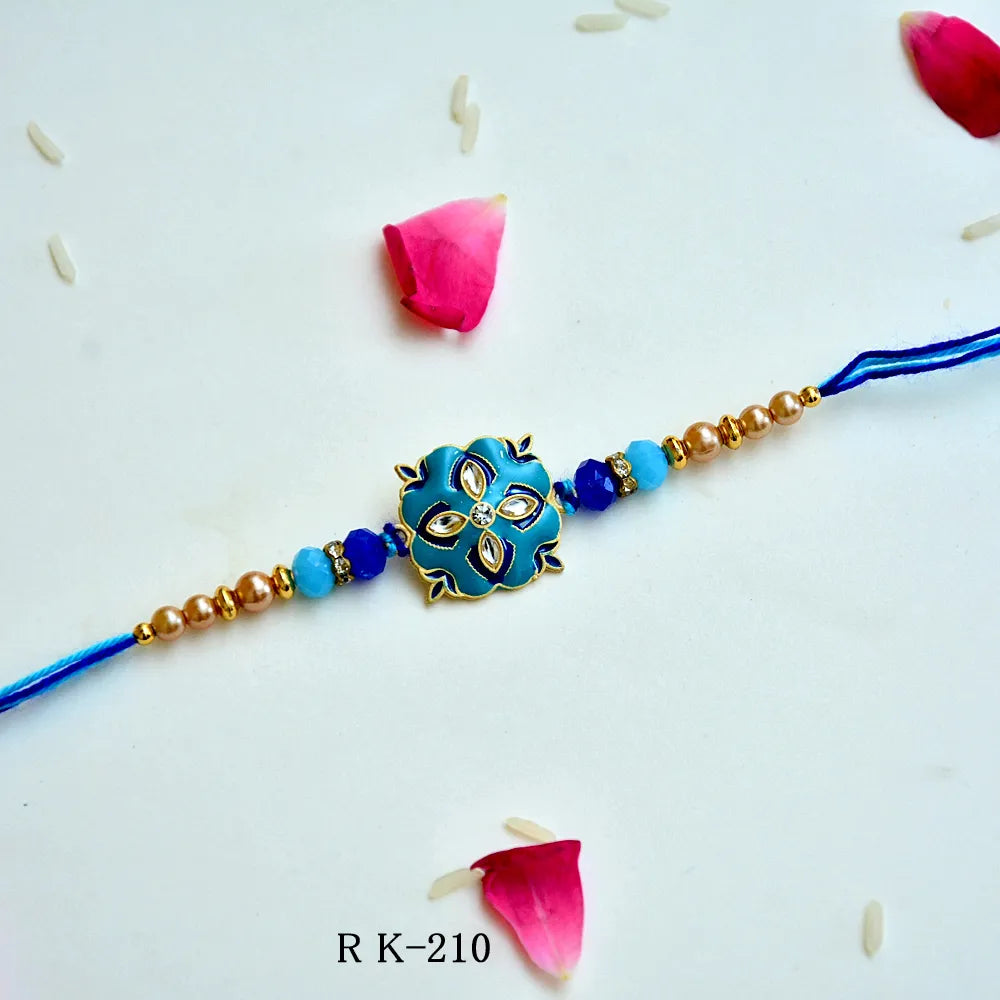 Cerulean Blossom Rakhi – RK-210 | Elegant Floral Blue Rakhi with Beads & Crystals
