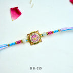 Lotus Elegance Rakhi – RK-213 | Artistic Lotus Design Rakhi with Pink & Blue Beads