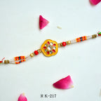 Vibrant Kundan Floral Rakhi – RK-217 | Traditional Rakhi with Beads & Multicolor Threads