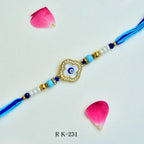 Evil Eye Protection Rakhi – RK-231 | Blue Beaded Charm with Crystal Studded Frame