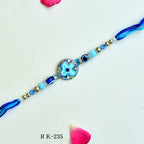 Blue Mandala Evil Eye Rakhi – RK-235 | Round Designer Centerpiece with Beaded Thread