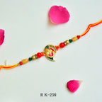 Traditional Ganesha Rakhi – RK-238 | Antique Finish Pendant with Multicolor Beads & Dual Thread
