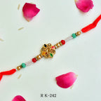 Multicolor Star Rakhi – RK-242 | Festive Rakhi with Colorful Enamel Design & Golden Beads
