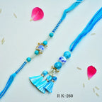 Sky Blue Ceramic Bead Bhaiya-Bhabhi Rakhi Set – RK-260 | Elegant Threadwork with Tassels & Pearls