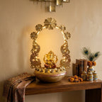 Exquisite Golden Metal Ganesha Idol with Illuminated Floral Arch and Peacock Base Accent I-412-A