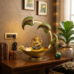 Exquisite Golden Metal Ganesha Idol with Illuminated Leaf Arch and Lotus Flower Urli Bowl Base I-411-A