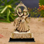 craftearth-black-metal-radha-krishna-plate-with-wooden-stand-2-min-600×600