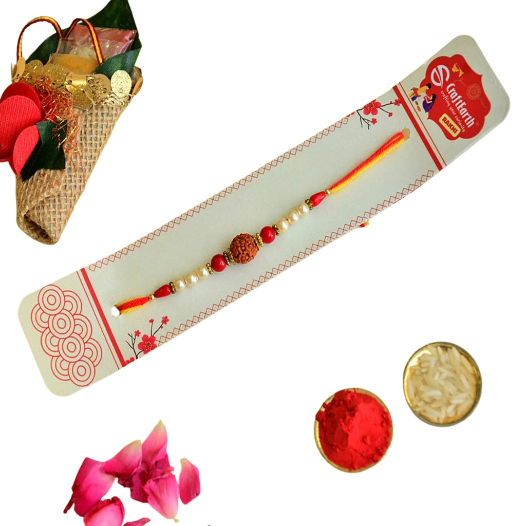 Divine Rudraksha Rakhi – RK-142 | Spiritual Thread with Pearls & Red Beads for Raksha Bandhan