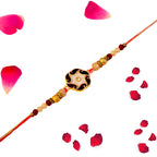 Elegant Swirl Rakhi – RK-158 | Stylish Rakhi with Beads & Classic Center Charm for Brother