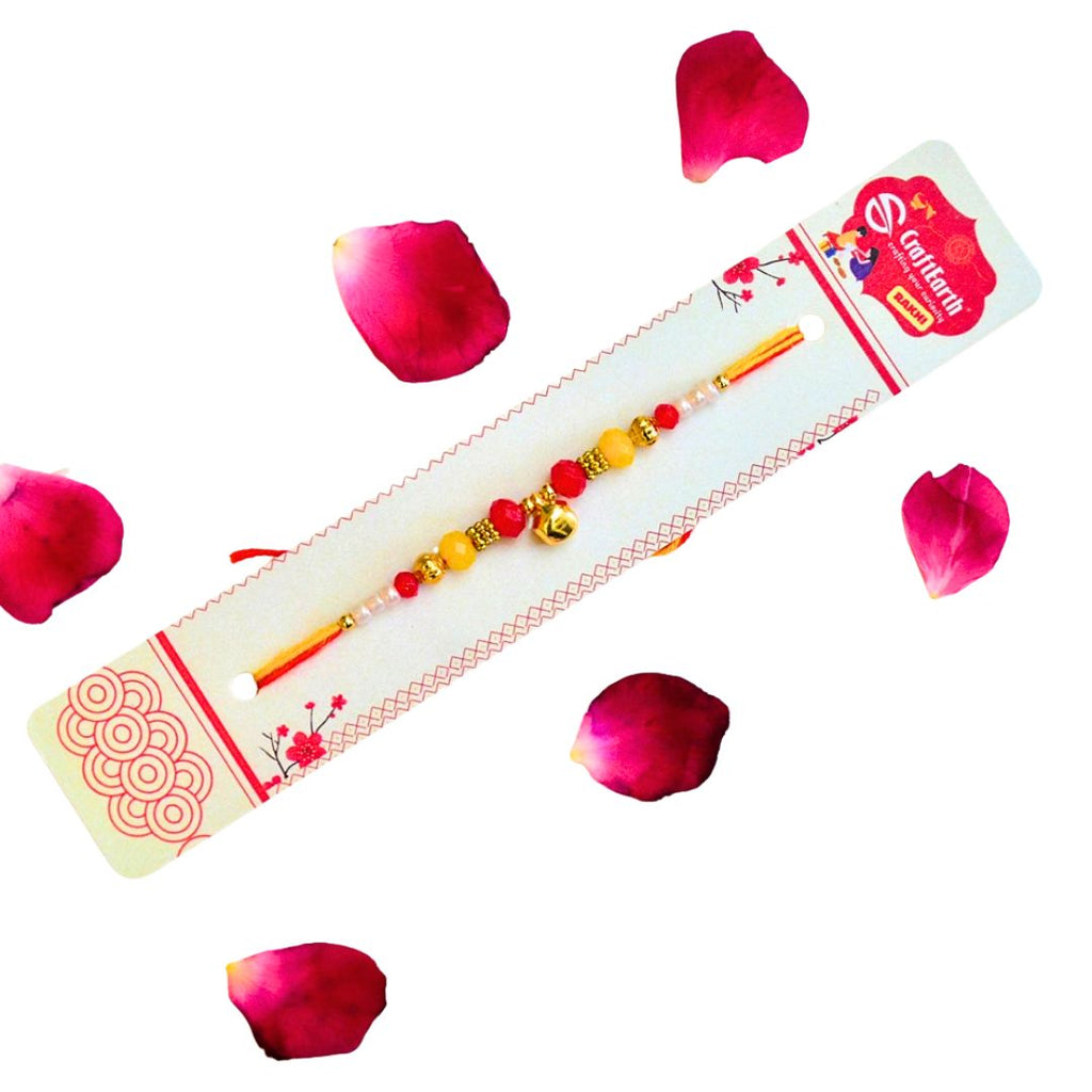 Traditional Ghungroo Rakhi - RK-302 | Elegant Rakhi with Red Stone, Pearl Beads & Crystal Embellishment for Brother
