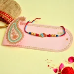 Handcrafted Designer Rakhi with Colorful Beads & Enamel Heart Charm – RK-6