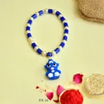 Blue Hero Rakhi for Kids – Trendy Cartoon Design - RK-14 - Image 2