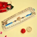 Elegant Ganesh Motif Rakhi - RK-36 | Blue Thread & Beaded Design - Image 3