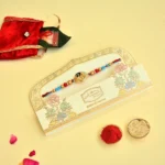 Elegant Peacock Feather with Om Spritual Rakhi - RK-38 - Image 2