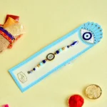 Blue Evil Eye Rakhi – RK-86 | Elegant Thread Rakhi with Turquoise & Navy Beads for Protection & Style - Image 2