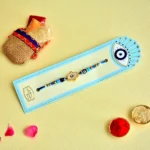 Modern Hamsa Hand Rakhi – RK-91 | Protective Evil Eye Charm with Blue Beads Rakhi for Brother - Image 2