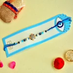 Mandala Evil Eye Rakhi – RK-92 | Intricate Mandala-Inspired Charm with Blue & White Beads for Protective Blessings - Image 2