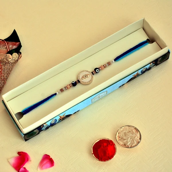 Evil Eye Protection Rakhi – RK-115 | Blue Gradient Thread with Crystal Accents - Image 2