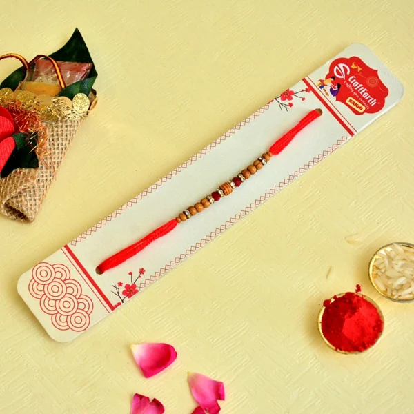 Traditional Wood Bead Rakhi – RK-124 | Minimal Red Thread with Natural Charm - Image 2