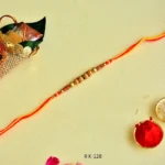 Festive Elegance Rakhi – RK-128 | Bright Orange Thread with Ornate Beads - Image 3
