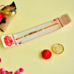 Rustic Red-Green Beaded Rakhi – RK-139 | Handcrafted Elegance - Image 2