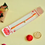 Elegant Red & Yellow Rakhi - RK-149 with Single Gold Bead - Image 2