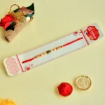 Elegant Rose Bead Rakhi with Red Thread – RK-153 - Image 2