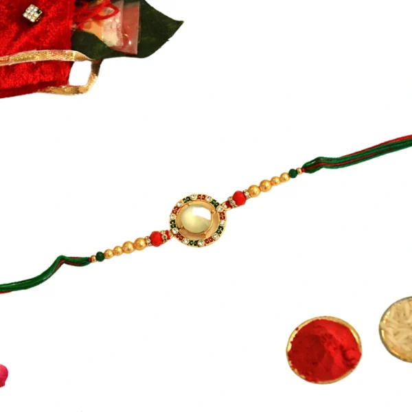 Regal Radiance Rakhi – RK-41 | Circular Kundan Dial with Pearl & Thread Detailing - Image 3