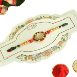 Royal Bloom Rakhi – RK-42 | Floral Kundan Circle with Pearl & Multicolor Thread Finish - Image 4