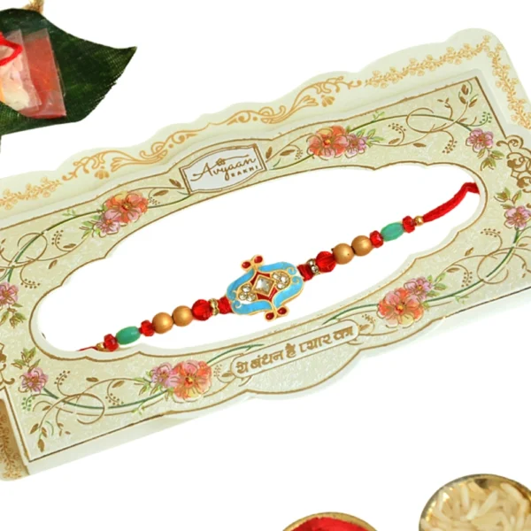 Blue Kundan Designer Rakhi – RK-48 | Intricate Gold Motif with Beads & Crystal Accents - Image 4