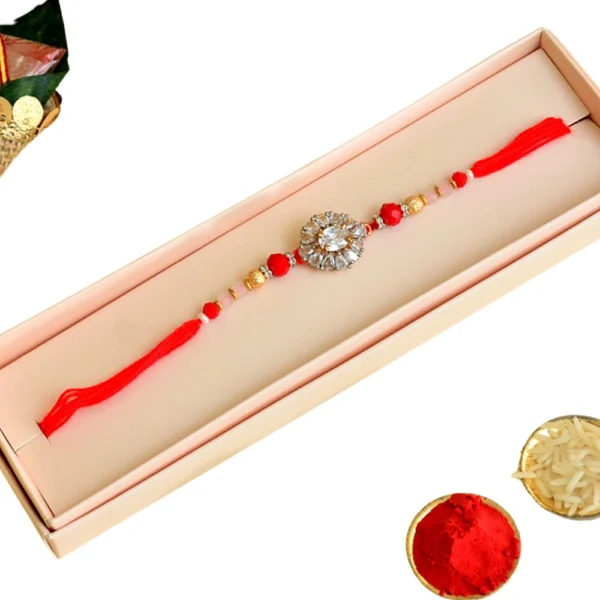 Crystal Bloom Rakhi – RK-118 | Red Thread with Floral Zircon Center & Gold Bead Detailing - Image 4