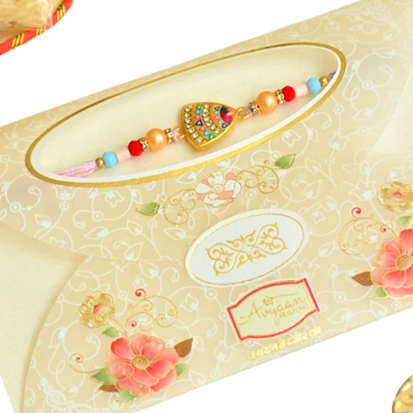 Vibrant Shield Rakhi – RK-59 | Rainbow Accents on Golden Base with Soft-Tone Thread - Image 4