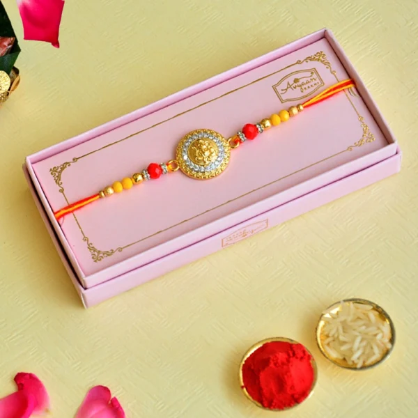 Royal Ganesha Coin Rakhi – RK-112 | Crystal-Studded Medallion with Golden & Red Bead Accents - Image 2