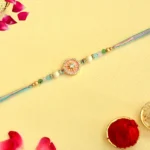 Pastel Mandala Rakhi – RK-113 | Elegant Floral Design with Soothing Beads & Multicolor Threads