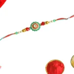Traditional Floral Rakhi – RK-53 | Red-Blue Thread with Mirror Work & Gold Beads - Image 3