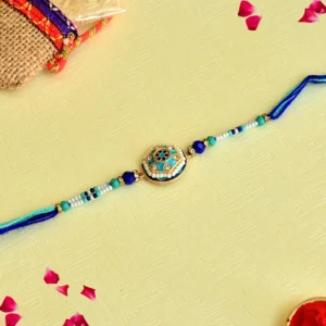 Mandala Design Centerpiece Rakhi – RK-82 | Elegant Blue Beaded Designer Thread Rakhi for Brother