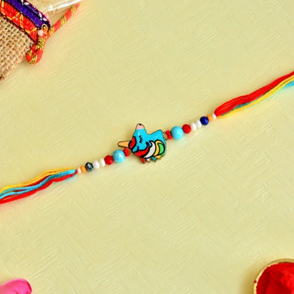 Playful Unicorn Rakhi – RK-93 | Multicolor Thread Rakhi with Cute Cartoon Charm for Little Brother